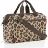 A studio shot of a leopard print duffel bag. Podgląd zdjęcia produktu