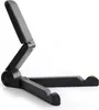 A black adjustable stand for a phone or tablet, shown on a white background. Náhľad obrázku produktu