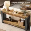 A console table with decorative items placed on it, situated in a living room setting. Anteprima dell’immagine prodotto