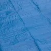 A close-up view of a blue tarp with a textured, grid-like pattern. Produktbild-Vorschau