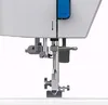 A close-up view of the needle and presser foot mechanism of a sewing machine. Produktbild-Vorschau