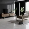 A modern living room setup with a TV stand, coffee table, and chair. Anteprima dell’immagine prodotto