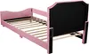 A pink upholstered bed frame with a black headboard, shown from a diagonal rear angle. Náhľad obrázku produktu