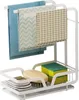 A white kitchen organizer rack holding dish towels, sponges, and a brush. Produktbild-Vorschau