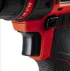 A close-up view of a red and black power drill, focusing on the trigger and torque settings. Produktbild-Vorschau