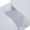 A close-up view of an open white drawer with a clear acrylic front. Produktbild-Vorschau