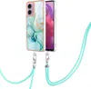 A phone case with a marble pattern and a lanyard is shown against a white background.