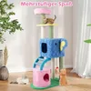 A cat tree with multiple levels and features, including caves, a ladder, and a toy, is shown in a room with two cats interacting with it. One cat is on the top level, and another is playing with a dangling toy. A third cat is lying on the floor nearby. Podgląd zdjęcia produktu