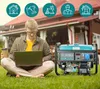 A man is sitting on the grass in front of a house, working on his laptop, with a generator next to him. There are icons above him representing different uses for the generator. Podgląd zdjęcia produktu
