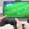 Two people playing a video game on a TV using controllers. Podgląd zdjęcia produktu