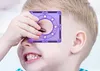 A child is looking through a purple magnetic building block. Náhľad obrázku produktu