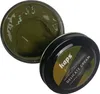 A jar of green shoe polish with its lid next to it. Produktbild-Vorschau
