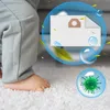 A child's foot on a white carpet, with graphics overlayed showing a vacuum cleaner bag and a virus. Voir les images du produit