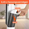 A close-up of a hand pressing a button on a vacuum cleaner to detach its dustbin. The image includes instructional text and arrows. Produktbild-Vorschau