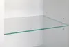 A close-up view of a glass shelf inside a white cabinet. Podgląd zdjęcia produktu