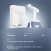 A white car vacuum cleaner and its packaging are displayed on a blue gradient background, with product specifications listed below. Produktbild-Vorschau