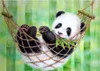 A painting of a panda in a hammock eating bamboo. Náhled obrázku produktu