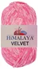 A ball of pink velvet yarn with a label. Produktbild-Vorschau