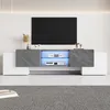 A modern TV stand with a television mounted above it, set in a clean, minimalist room. Anteprima dell’immagine prodotto