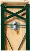 A close-up view of the hinge mechanism and green metal frame of a wooden bench. Náhled obrázku produktu