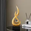 Unyqoos® Gouden abstracte vlamsculptuur van hars en glas, Productafbeelding-voorbeeld 3