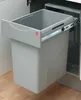 A pull-out trash bin system installed inside a cabinet. Náhled obrázku produktu