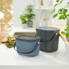 Two compost bins are on a kitchen counter next to a sink with asparagus on a cutting board. Náhľad obrázku produktu