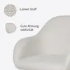 Close-up of a light-colored fabric chair with text overlays highlighting material and breathability. Podgląd zdjęcia produktu