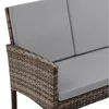 Close-up of a section of a polyrattan garden furniture set, showing the armrest and cushions. Produktbild-Vorschau
