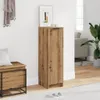 A shoe cabinet in a hallway next to a bench and a plant. Voir les images du produit