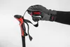 A gloved hand holding a ski pole grip. Anteprima dell’immagine prodotto