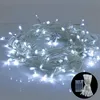 A bundle of white LED string lights coiled on a reflective surface. Anteprima dell’immagine prodotto