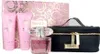 A Versace Bright Crystal Eau De Toilette gift set is displayed against a white background. The set includes a perfume bottle, two lotion tubes, and a black cosmetic bag. Podgląd zdjęcia produktu