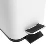 A close-up view of the pedal mechanism of a white trash can. Náhled obrázku produktu