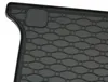 A close-up view of a black rubber car floor mat with a textured pattern. Náhľad obrázku produktu