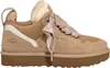 A side view of a beige UGG sneaker with pink laces and a white stripe detail. Produktbild-Vorschau