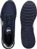 A top-down view of a pair of navy blue Puma sneakers, showing the top of one shoe and the sole of the other. Anteprima dell’immagine prodotto