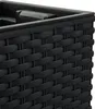 A close-up view of the woven texture of a black planter. Náhled obrázku produktu