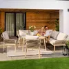 A couple relaxing on a patio furniture set on a wooden deck with a grassy lawn in the foreground. Náhľad obrázku produktu