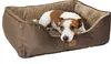 A dog lying in a dog bed. Produktbild-Vorschau