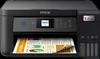 A black Epson inkjet printer is shown from the front, with a document partially printed and sticking out of the paper tray. The printer has a small screen and control buttons on the top. Ink cartridges are visible on the right side. Podgląd zdjęcia produktu