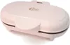A closed white waffle maker on a white background. Podgląd zdjęcia produktu