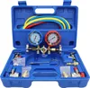 A blue plastic case containing a set of AC diagnostic tools, including gauges, hoses, and connectors. Produktbild-Vorschau