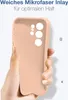 A hand holding a pink phone case. Produktbild-Vorschau