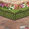 A garden border fence with flowers and paving stones. Produktbild-Vorschau
