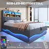 A modern bedroom with a grey upholstered bed frame featuring integrated LED lighting and a headboard with shelving. Náhľad obrázku produktu