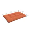 A diagram showing the dimensions of an orange cushion. Voir les images du produit