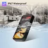 A pager system device is shown partially submerged in water, with a restaurant interior in the background. Náhled obrázku produktu
