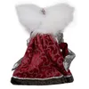 A decorative angel figurine, viewed from the back, with white feathery wings and a red, ornate cloak. Podgląd zdjęcia produktu