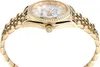 A close-up side view of a gold-colored watch with a diamond-encrusted bezel and a mother-of-pearl dial. Podgląd zdjęcia produktu